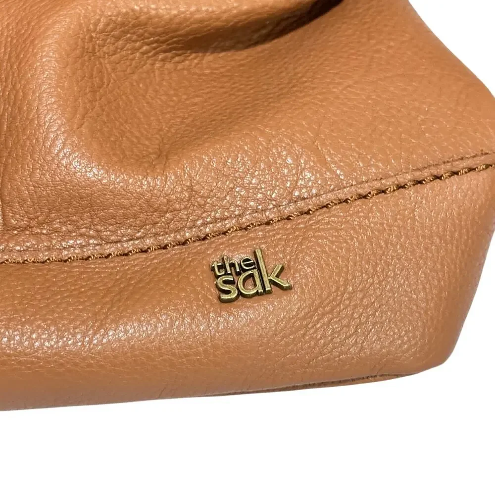The Sak caramel brown leather messenger bag studded backpack Boho casual purse